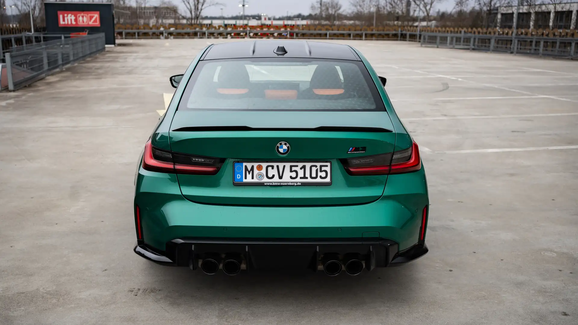 Green BMW M3 rear view